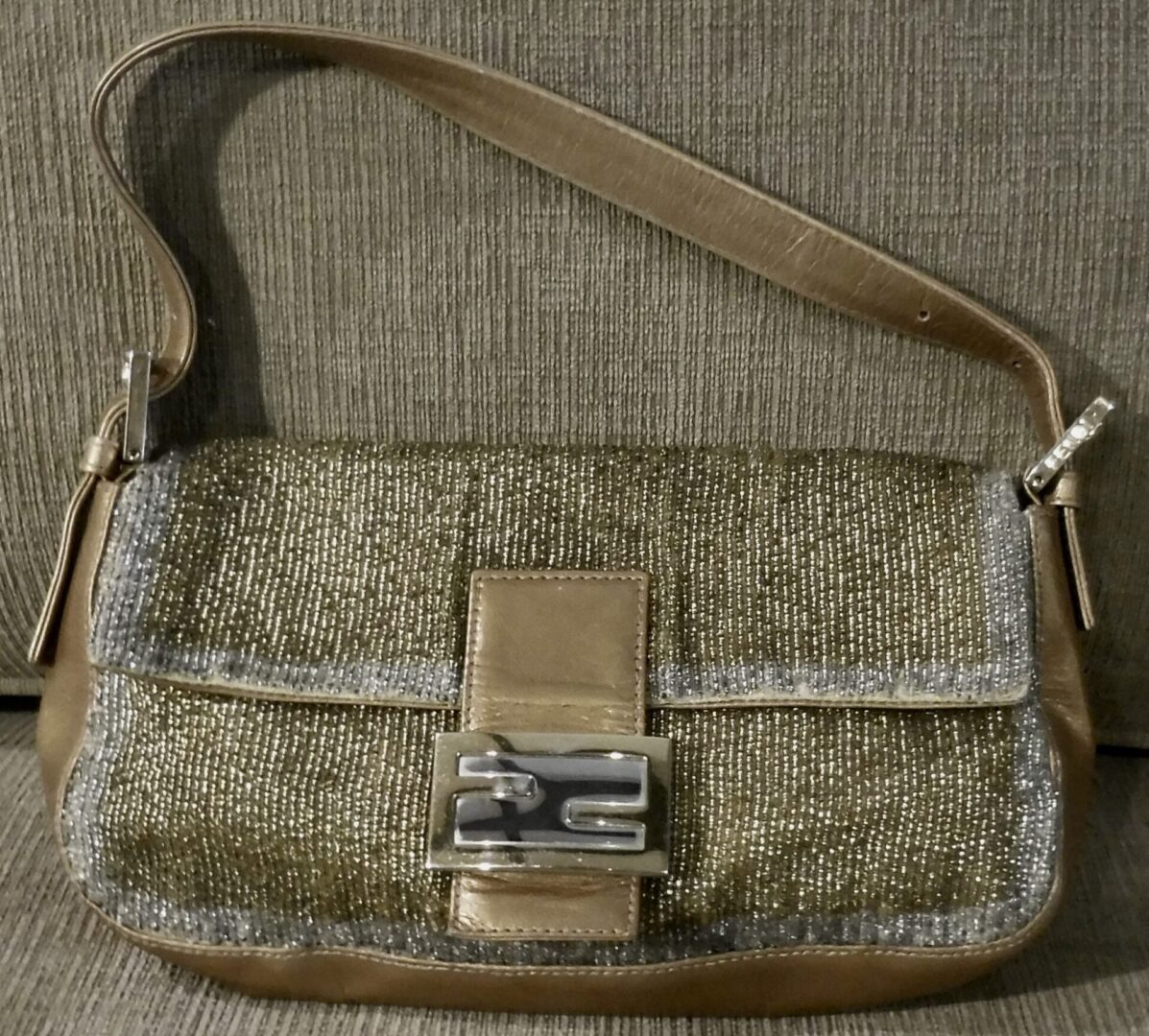 Beaded gold Fendi handbag with silver trim.