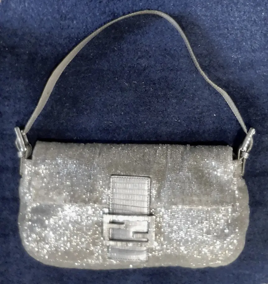 Silver Fendi baguette purse with sequins.