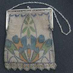 Vintage beaded purse with floral design.