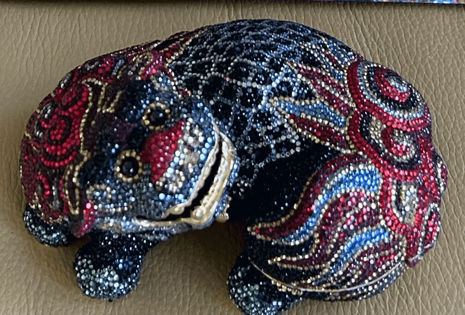 Rhinestone jeweled foo dog figurine.